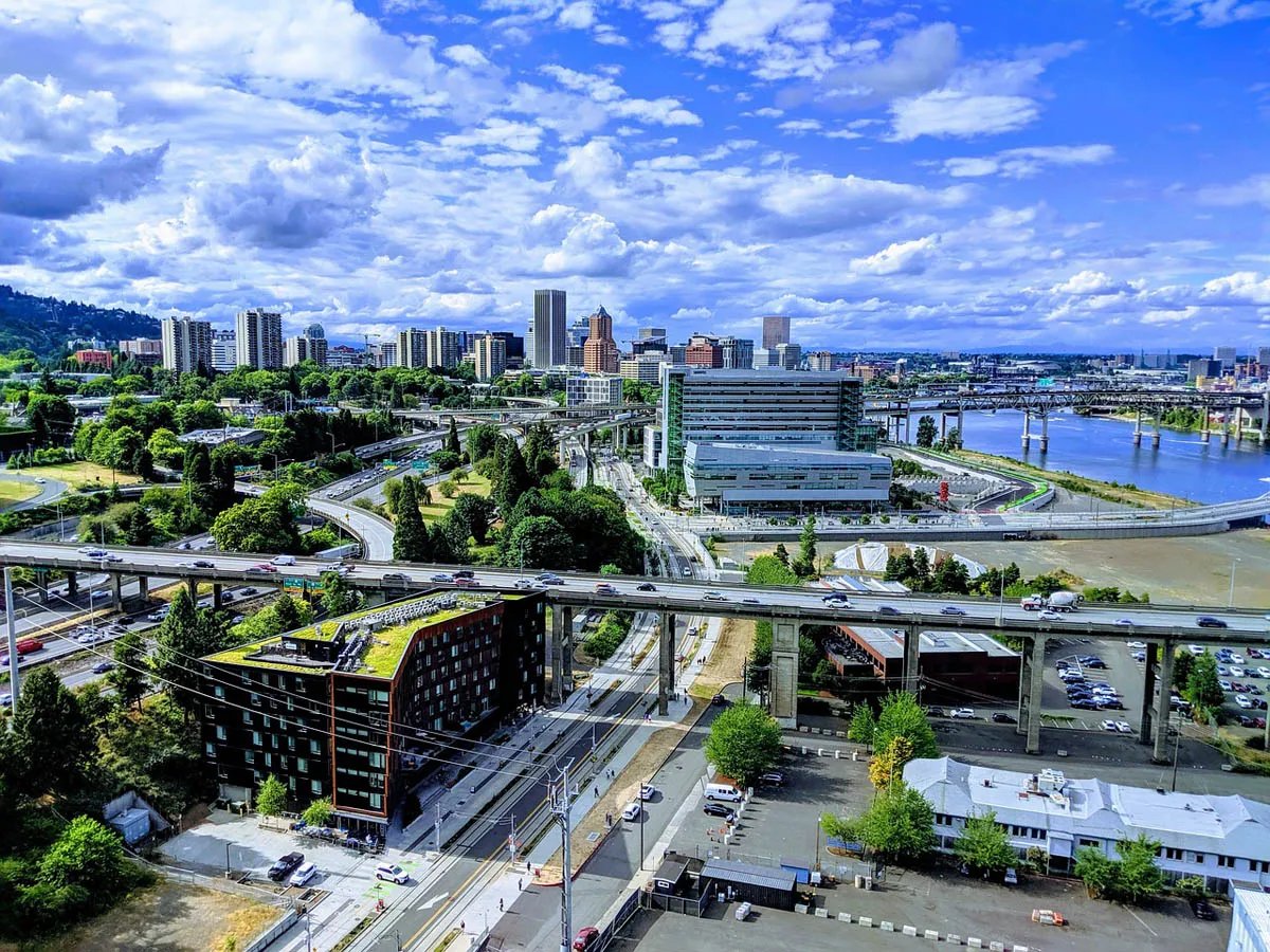 Scenic view of Portland's cityscape with river and bridges and buildings