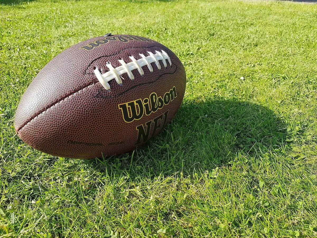 closeup of a flag football on grass