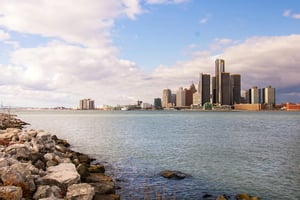 Cityscape of downtown Detroit with water in the forefront