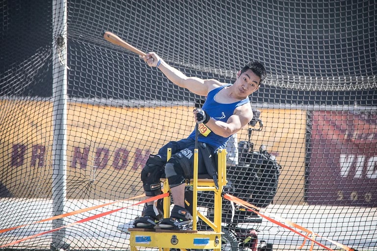 athlete steve f doing wheelchair club throw