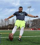 male football kicker praticing
