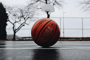 basektball lying on outside court closeup