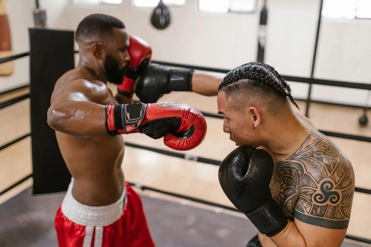 two male boxers sparring