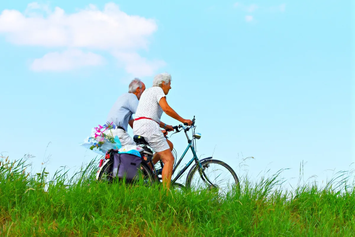 older adults riding bikes