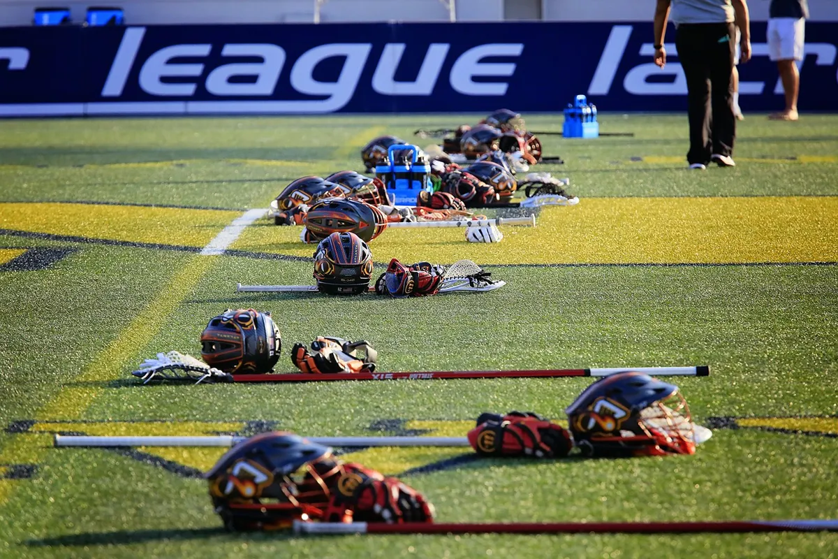 lacrosse gear spread on field