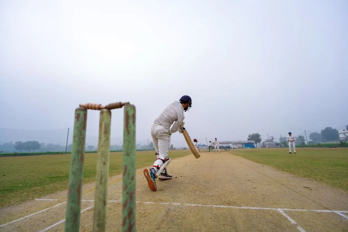 man getting bowled to cricket