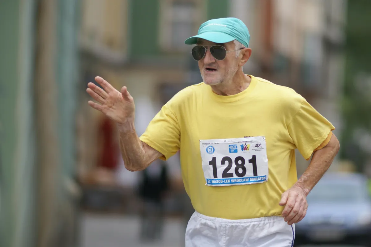 older adults man running race