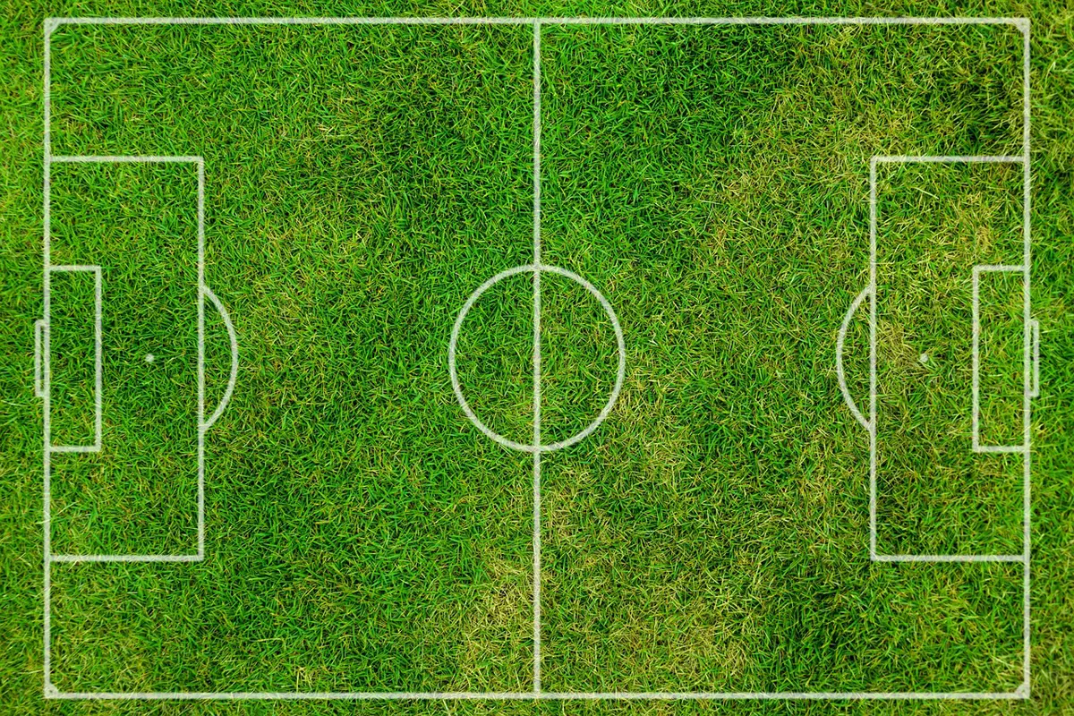 overhead view of grassy soccer pitch with clearly defined lines